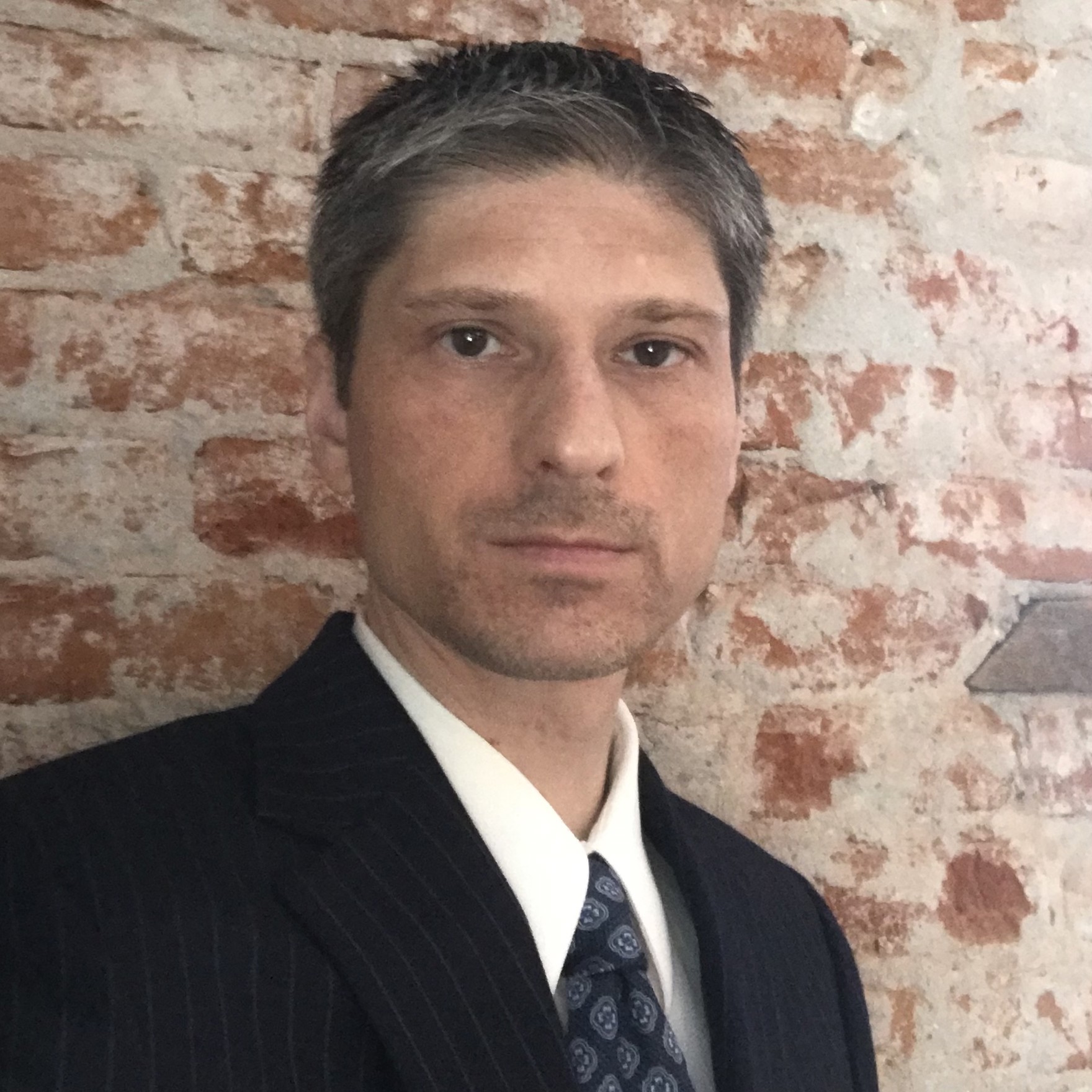 Headshot of Kyle Guelcher